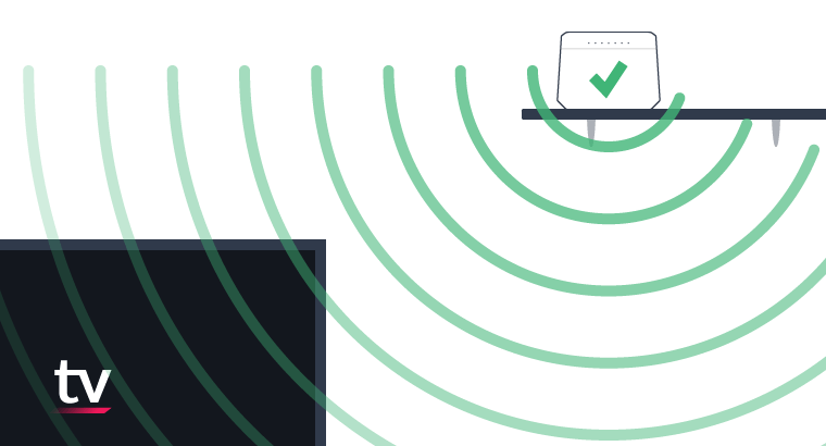 Billede af en router, som er placeret på gulvet bag en sofa.